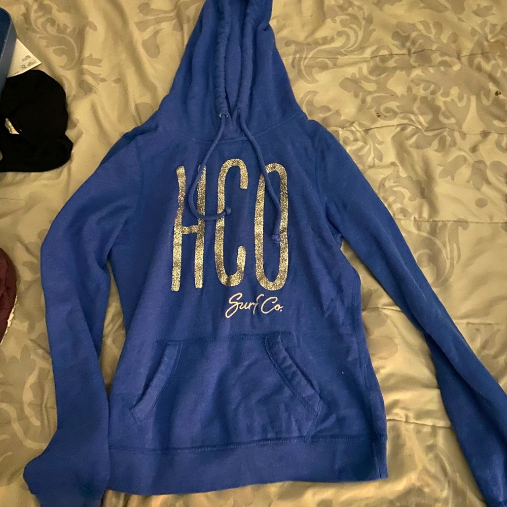 Blue sparkly Hollister hoodie.